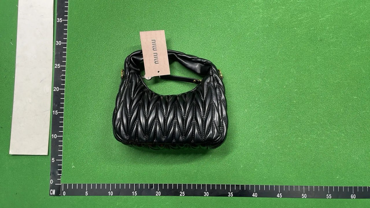 Miu Miu — Quilted hobo bag — QC 1